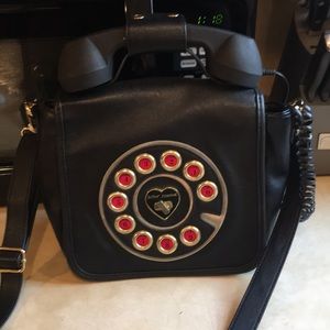 Betsey Johnson phone purse.